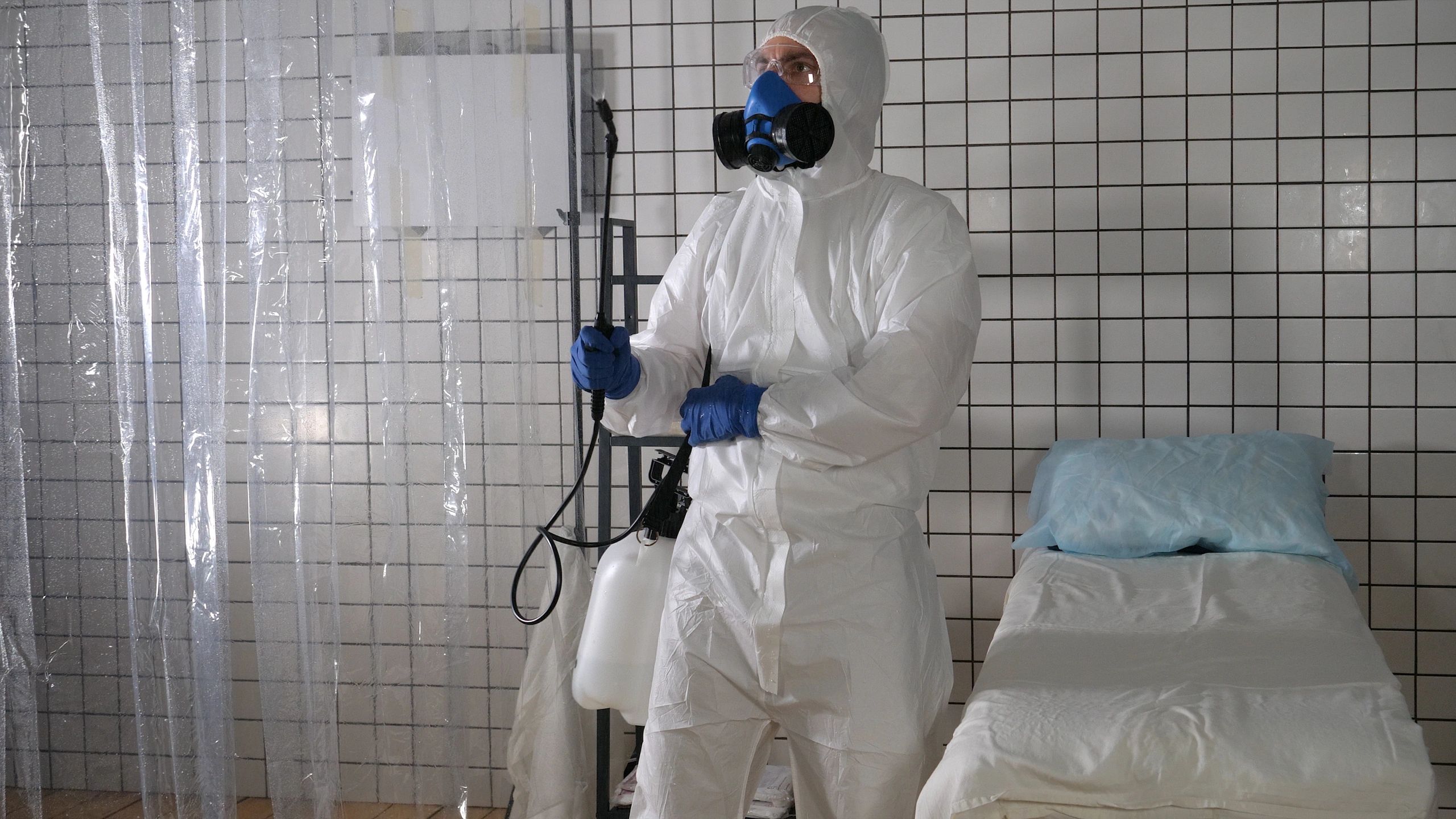 Professional cleaning and disinfection in a hospital room