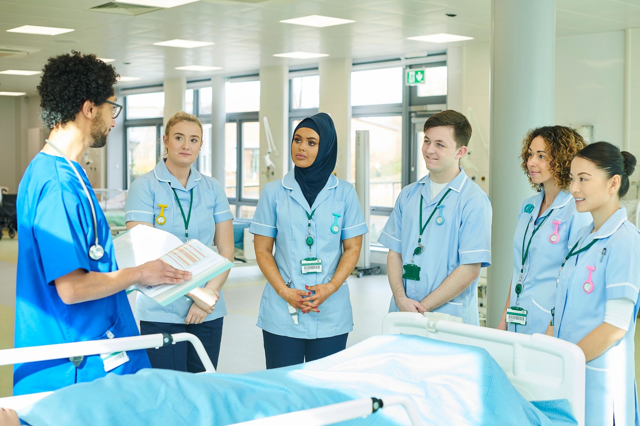 Healthcare staff in a clinic corridor